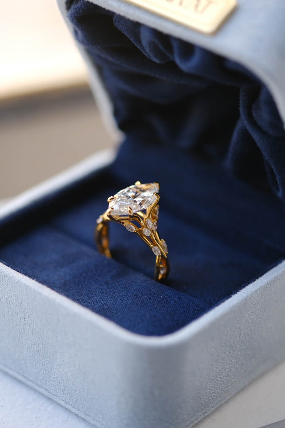 Marquise vine setting, yellow gold
